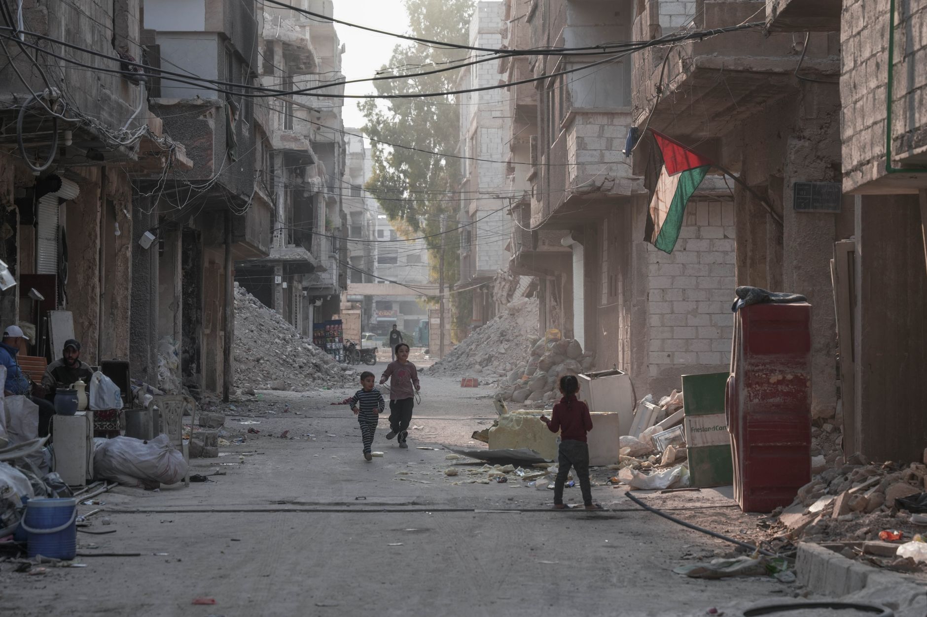 children playing in damascus war torn street